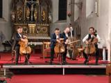 Známé filmové melodie i klasiku zahráli zaplněnému kostelu Prague Cello quartet.